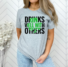 Load image into Gallery viewer, Drinks Well With Others Shamrock Tee